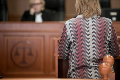 woman speaking court