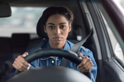 woman upset driving